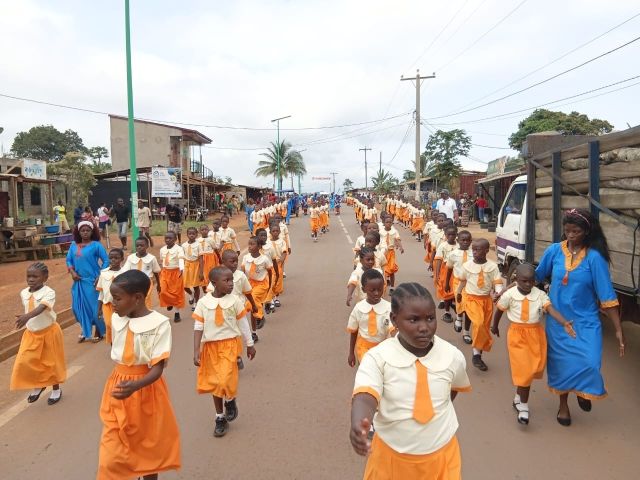 Pupils marching in a parade